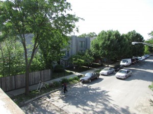 A view of my own street, North Campbell Avenue, from the trail crossing above.